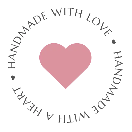A soft pink pixelated heart centered within a circular border of gray text.